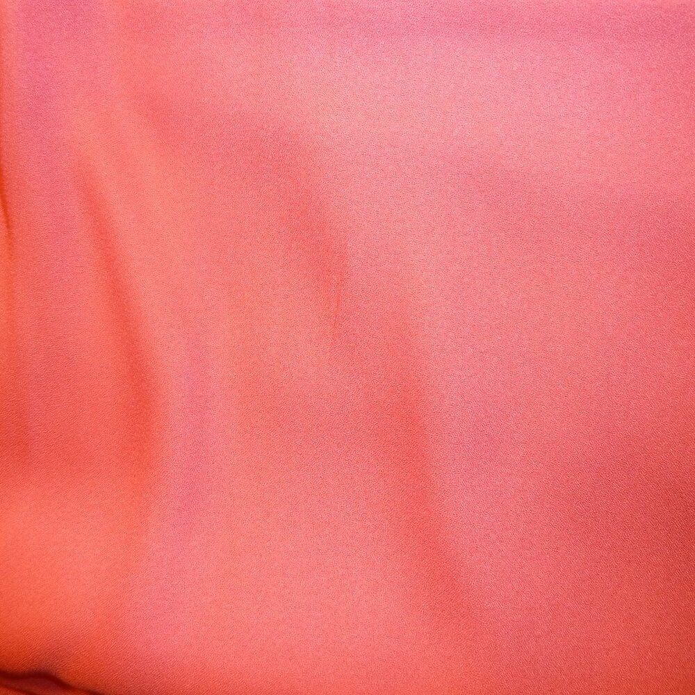 Luxurious fabric in solid coral pink
